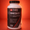 Maxi Nutrition Omega 3 supplement bottle on a red background